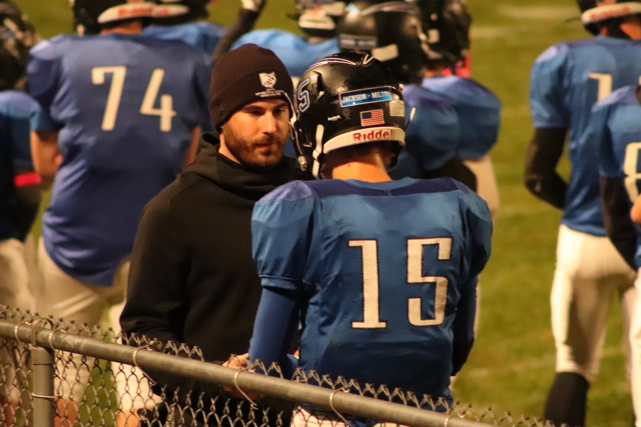 OSSI Dr. Andrew Hospodar at High School game on sideline